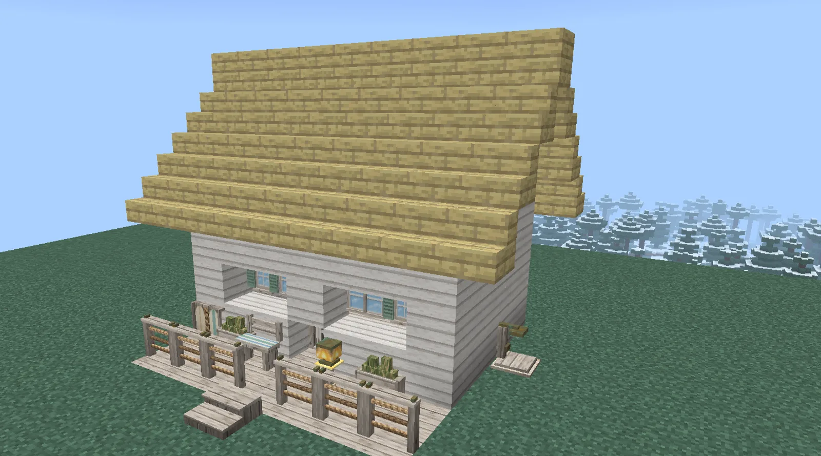 A Minecraft beach house with white shiplap walls, a pale birch roof, shuttered windows, a deck with rope railings and a surfboard rack